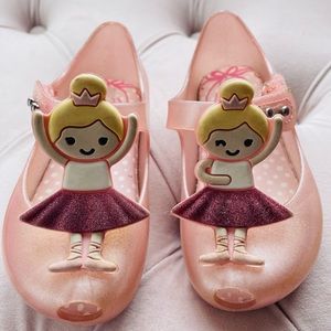 Pink ballerina Mini Melissa shoes.
